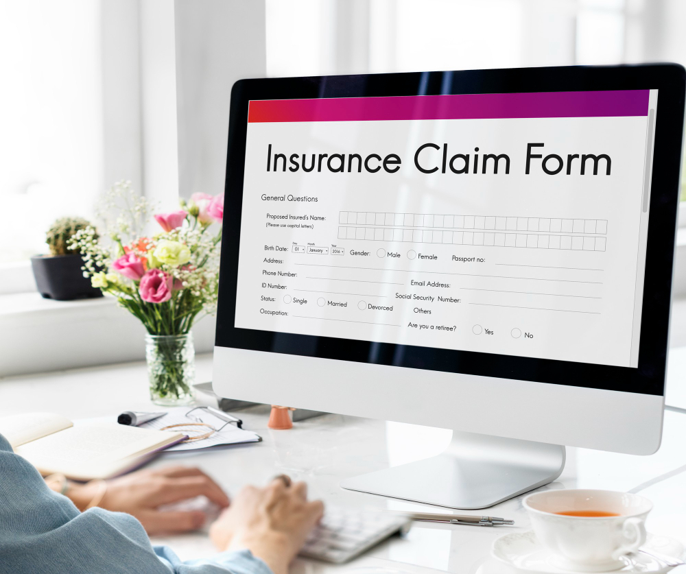 An insurance claim form on a desktop screen.